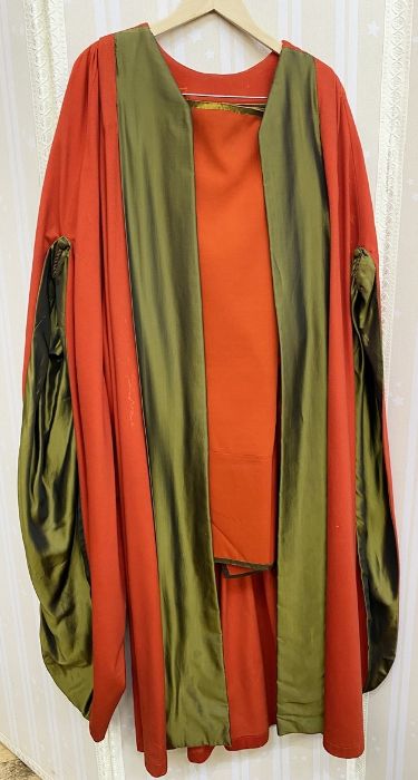 Academic robe in red wool with green satin slashed sleeves and front panel and two wool tabards