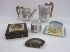 Picquot Ware pewter three piece tea set, a Biarritz art deco cup & saucer an onyx ashtray and onyx