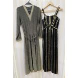 A 1970s black and gold lurex V-necked maxi dress with matching belt and a black cocktail dress