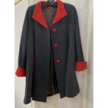 Rolands green loden wool three-quarter length coat with silver-coloured buttons, a striped