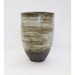 Victor Priem (Latvian 1925-1989) a stoneware vase with mottled green glaze and incised decoration,