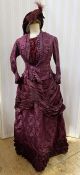 Victorian damask and satin walking dress with bustle, fitted bodice, boned, pleated and tiered hem