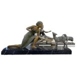 20th century spelter figural group of female form with lamb, mounted on a black marble base, 65.