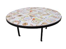 Roger Capron (1922 -2006) Tile-topped coffee table, circular, the tiles depicting fruit, sea