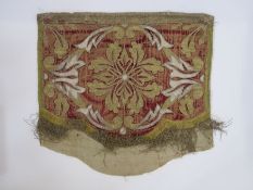 Late eighteenth century red velvet and gold thread-embroidered panel possibly a cope hood, linen-