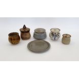 Three pieces of Robert Tinnyunt (b.1940) to include a stoneware lidded jar with iron and cobalt