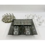 Set of four Pukeberg glass tealight holders together with assorted candle holders to include clear