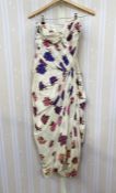 A 1940s/50s evening gown, strapless, boned, cream, printed with purple and pink roses, the hemline
