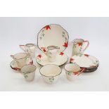 Hampton Pottery Art Deco "Ivory" pattern part service to include three cups & saucers, three jugs,
