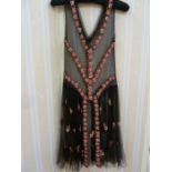 French 1920's museum quality black net flapper dress,  embroidered with tiny beads in pink, red,