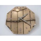 Mid-20th Century "Smith's English Clocks Ltd"  electric glass wall clock, octagonal, pink-mirrored