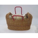 Vintage wicker and plastic picnic set with red cane handles