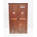 20th century stained pine two-door wardrobe with rectangular top over two panelled doors, on