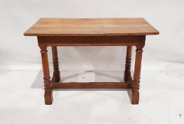 Modern oak two-drawer side table, the rectangular top above two drawers, on turned and block