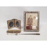 Silver-mounted travelling photograph frame, floral repousse decorated, London, date marks won,