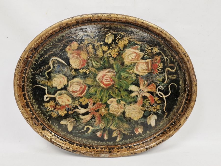 Large papier-mache ebonised oval tray with gilt and hand-painted floral decoration