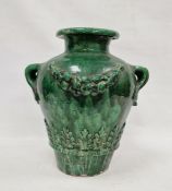 19th century French / Continental green glazed searthenware twin-handled pot with wreath and leaf