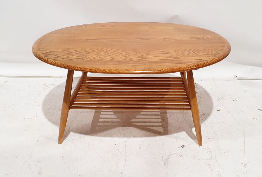 Ercol light elm-topped coffee table with beech magazine rack under, 44cm x 98cm x 83cm Condition