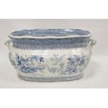 Large blue and white footbath with floral decoration, indistinctly marked to base, 21cm x 47cm x