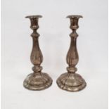 Pair of early 20th century silver-coloured metal, possibly German candlestick holders, marks worn,