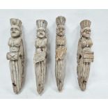 Set of four possibly 19th century carved wooden corbels of female form