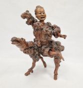 Japanese root carving of a figure on horseback