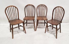 Set of four early 20th century elm-seated stick-back chairs