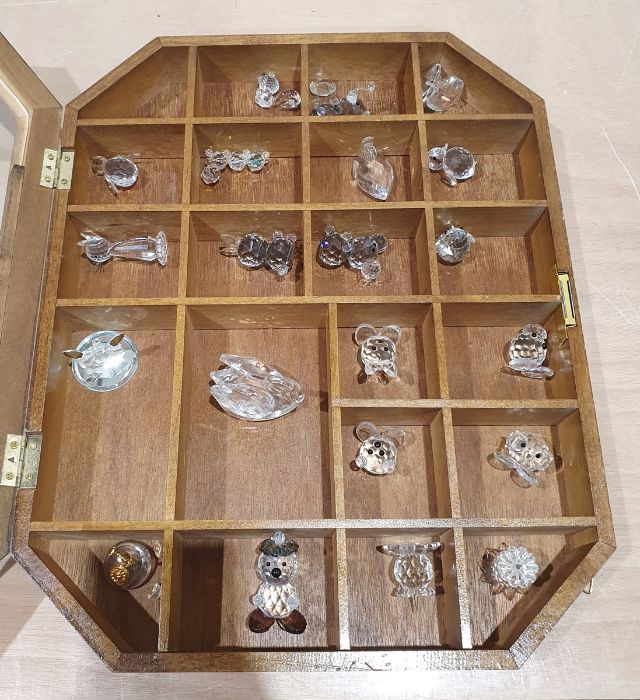 Quantity of Swarovski crystal animals to include swans, penguin, elephant, duckling, bird, etc (21)