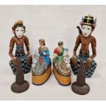 Pair of Eastern wooden carved seated figures and two Eastern papier-mache models of male and