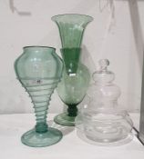 Early 20th century green glass vase of inverse baluster form with circular foot and exterior trail