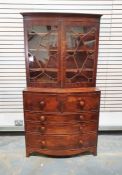 Victorian mahogany bowfront secretaire bookcase with astragal glazed doors above fitted secretaire