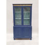 20th century painted cabinet, the leaded glazed doors enclosing shelves above two linenfold cupboard