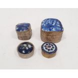 Two Oriental silver-coloured trinket boxes with white ceramic insert to lid, repousse decorated, 5.