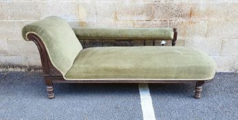Edwardian stained oak framed chaise longue with green upholstery and turned legs