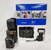 Vintage Polaroid Propack camera and flash, boxed with instructions together with a vintage Lubitel