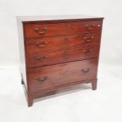 19th century mahogany chest of four long graduated drawers, the rectangular top with applied edge,