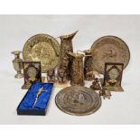 Quantity of brass items to include plates, jugs, vases, bookends, fireside companion items,