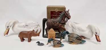 Three carved wooden models of ducks, a carved hardwood model of a rhino, other carvings, wooden