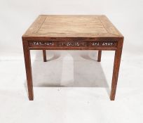 20th century Eastern hardwood square-topped table with carved and pierced sides on square legs