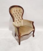 19th century-style armchair in pale green buttonback upholstery
