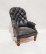 Low leather armchair with button-back on turned front legs Condition ReportH. 96cm x W. 68cm x D.