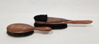 Two railwayana interest wooden clothes brushes marked LMS