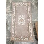 Pair of Chinese cream ground superwash rugs with central floral medallion and floral borders 148cm x