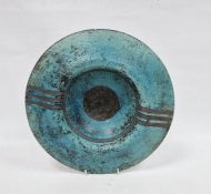 Studio pottery charger in turquoise and black decoration, on a circular bowled foot, initialled '