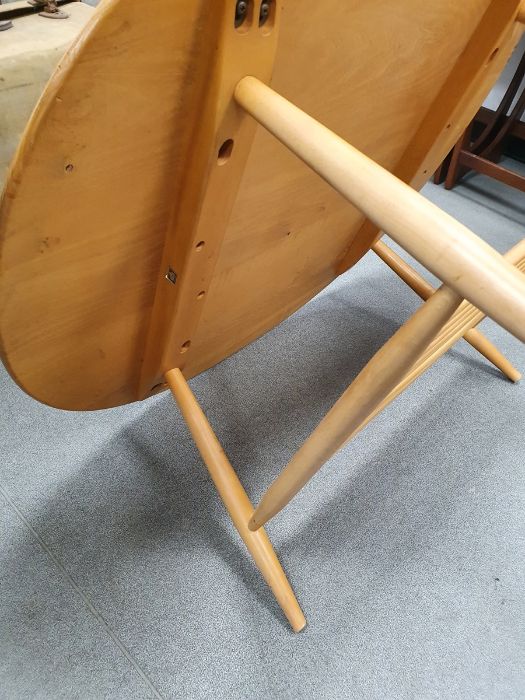 Ercol light elm-topped coffee table with beech magazine rack under, 44cm x 98cm x 83cm Condition - Image 13 of 17