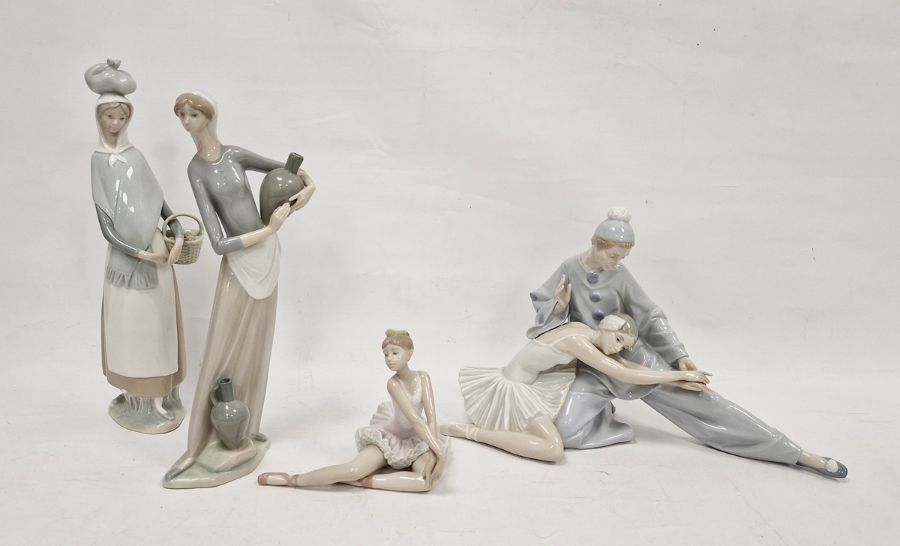 Assorted Lladro figures to include woman with jugs, ballerina, etc (4) Condition ReportNo obvious