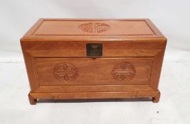 Modern Chinese camphorwood lined chest, the body with moulded shou symbols, 56cm x 101cm x 50cm