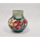 Moorcroft vase, the ovoid body with floral decoration, initialled WM in blue to base, 12cm high