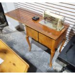 20th century walnut cabinet with Necchi Supernova automatic sewing machine