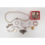 Silver leaf brooch, a beaded necklace, a silver-coloured metal full eternity ring, quantity of coins